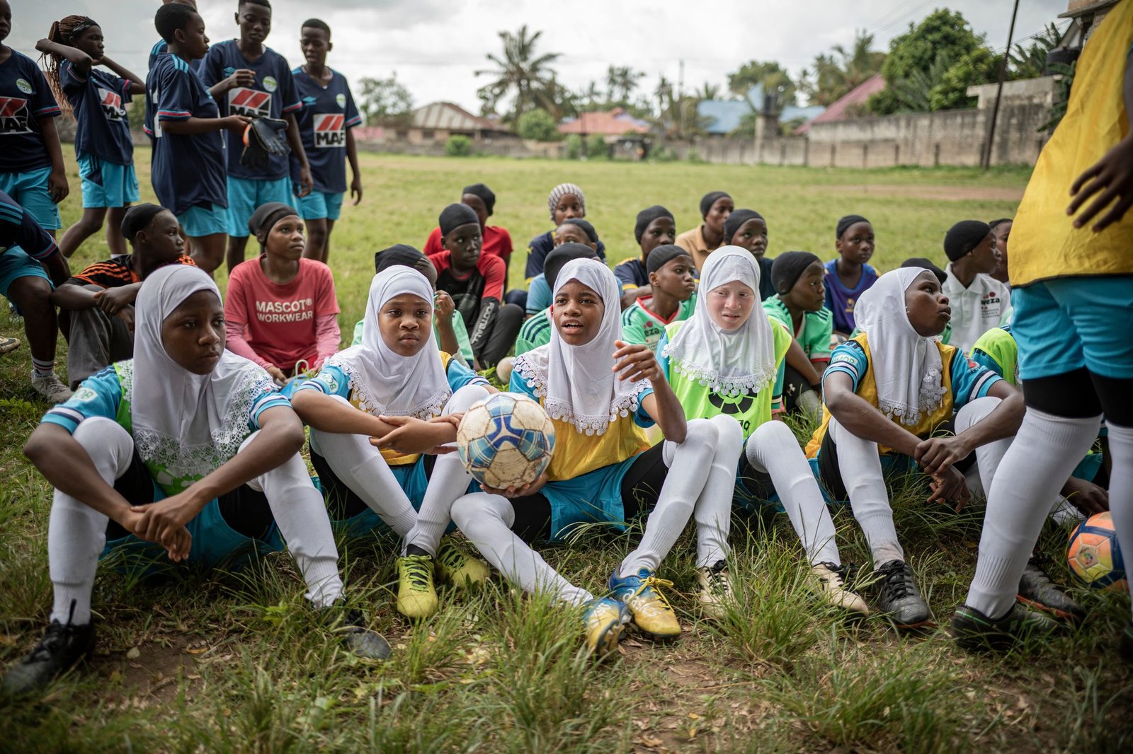Girls seated listening